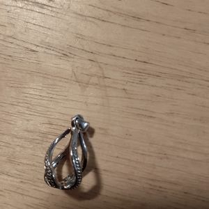 Empty silver cage pendant